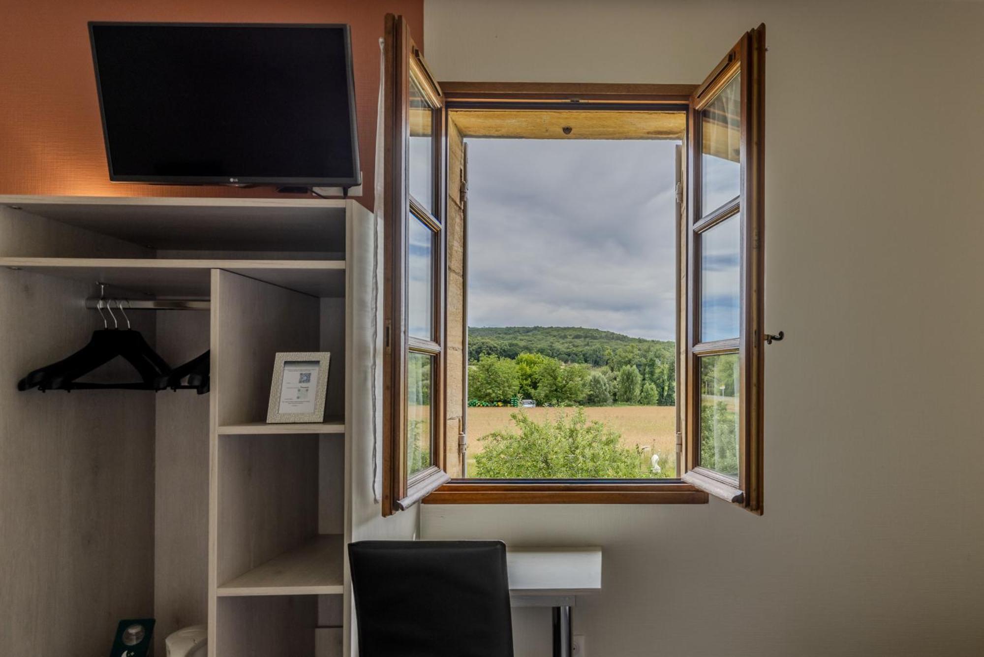 Logis Hotel Archambeau Thonac Esterno foto
