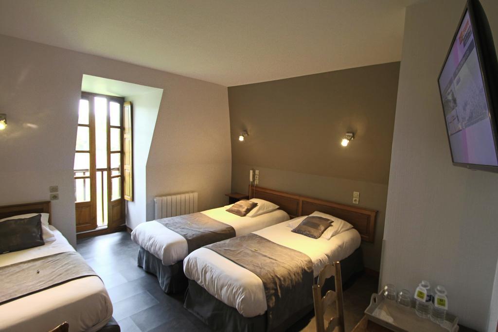 Logis Hotel Archambeau Thonac Esterno foto
